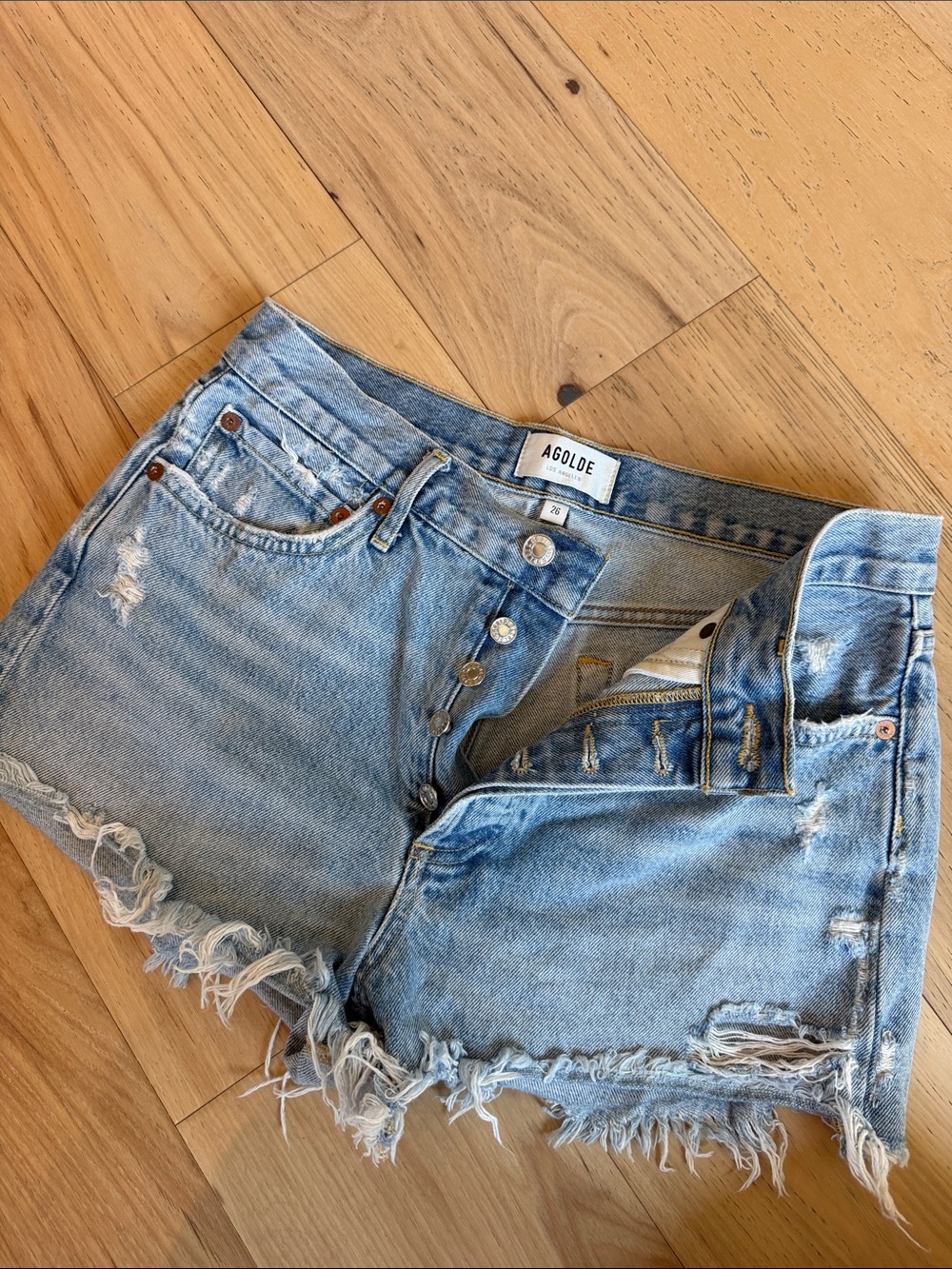 Agolde Light Blue Distressed Cutoff Denim Shorts